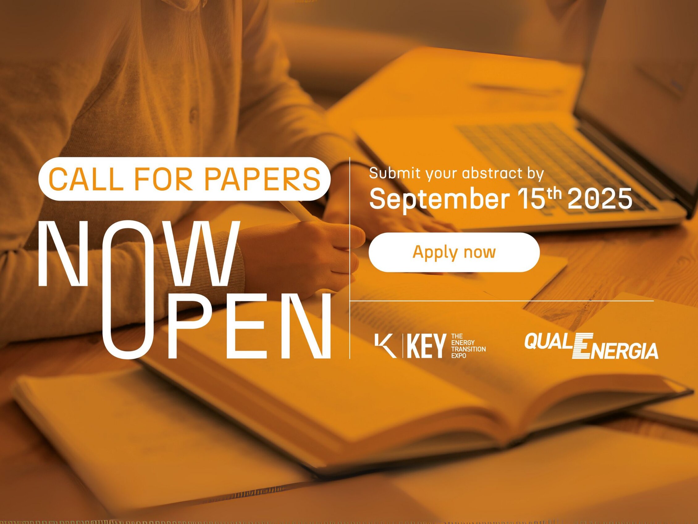 Promotional banner for the call for papers of K.E.Y. and QualEnergia, with the abstract submission deadline on September 15th, 2025. In the background, a person writing with a laptop and an open notebook