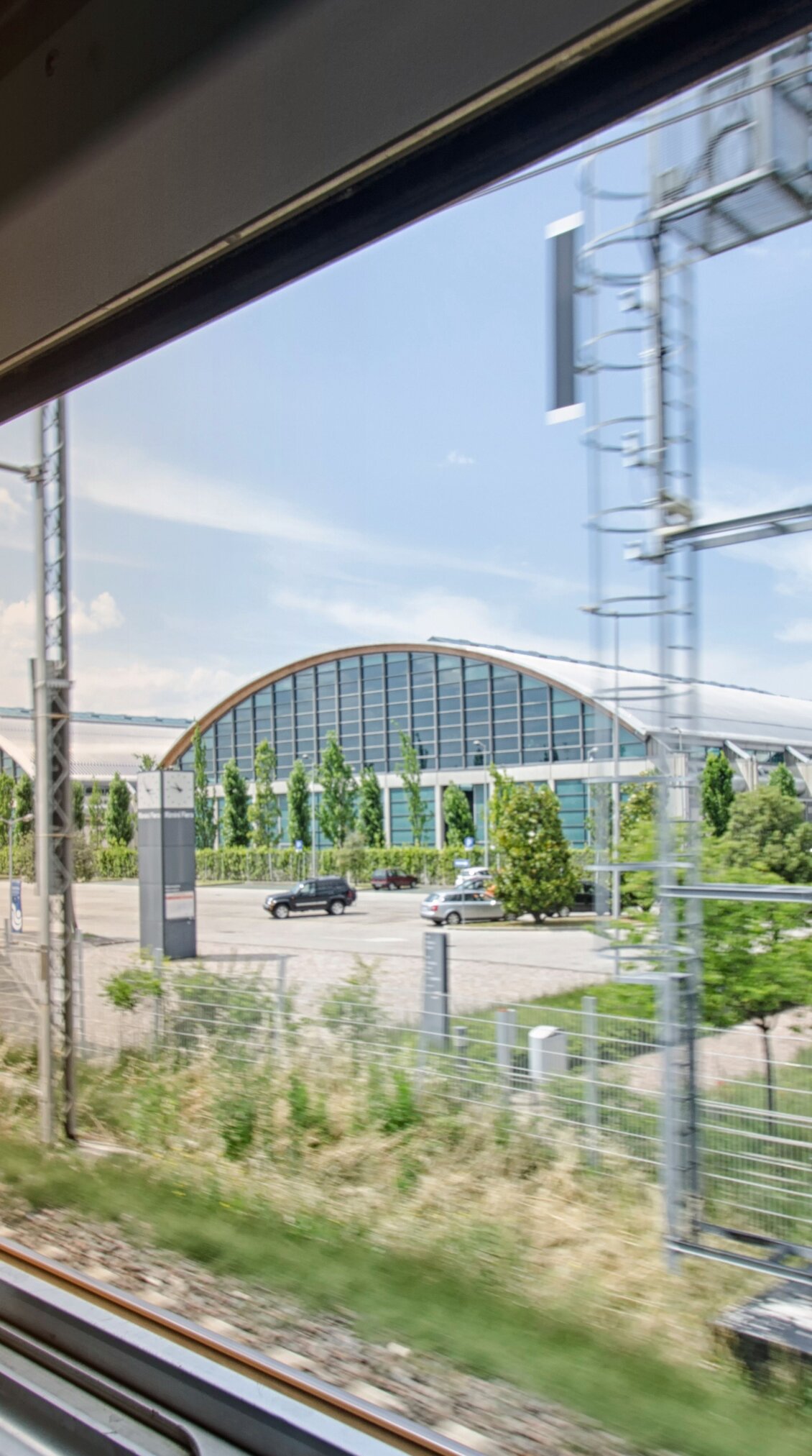 rimini expo centre seen through the window of a train rimini expo centre seen through the window of a train