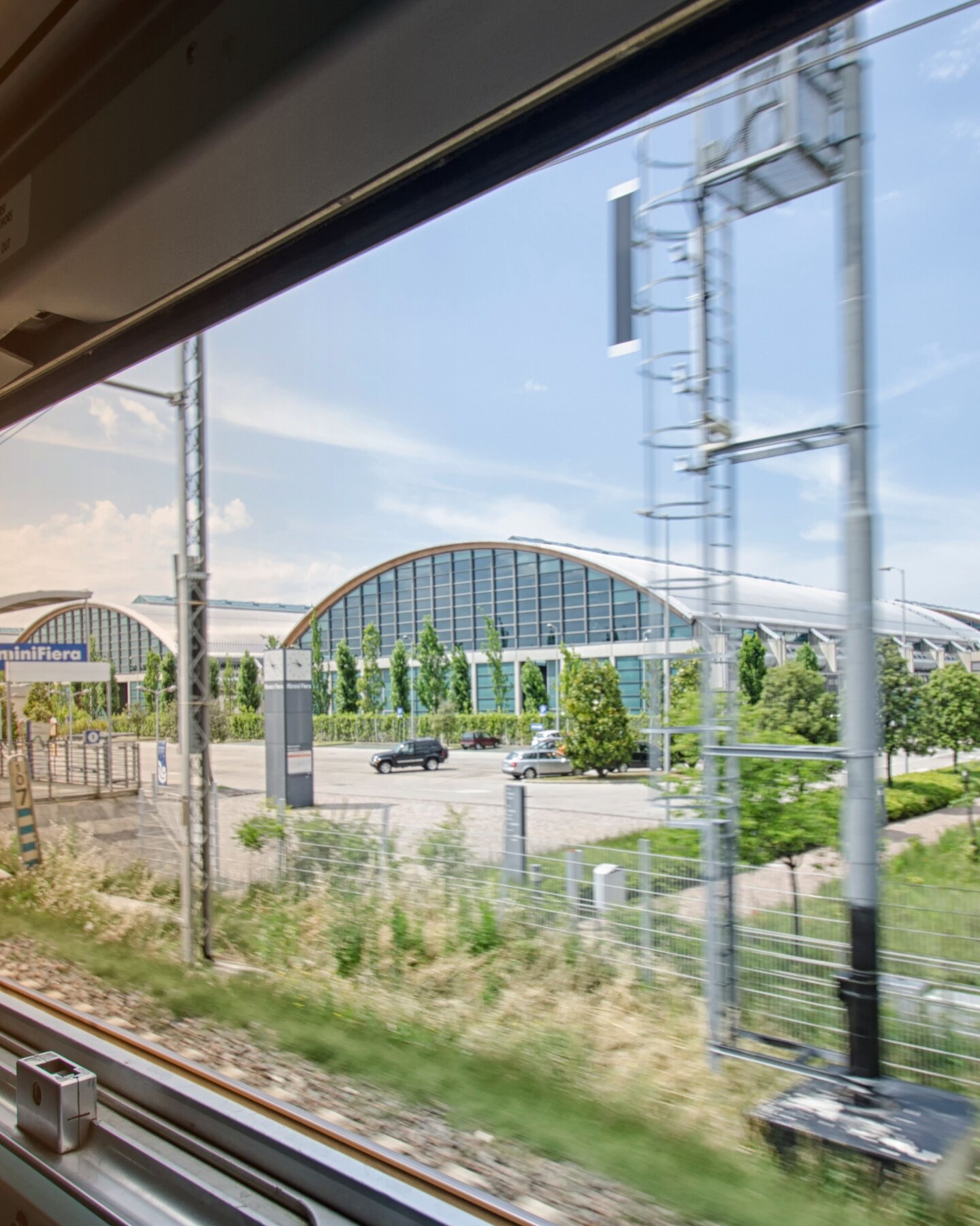 rimini expo centre seen through the window of a train rimini expo centre seen through the window of a train